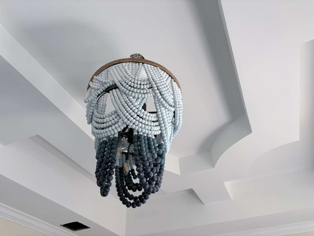 Decorative beaded chandelier detail — luxury renovation
