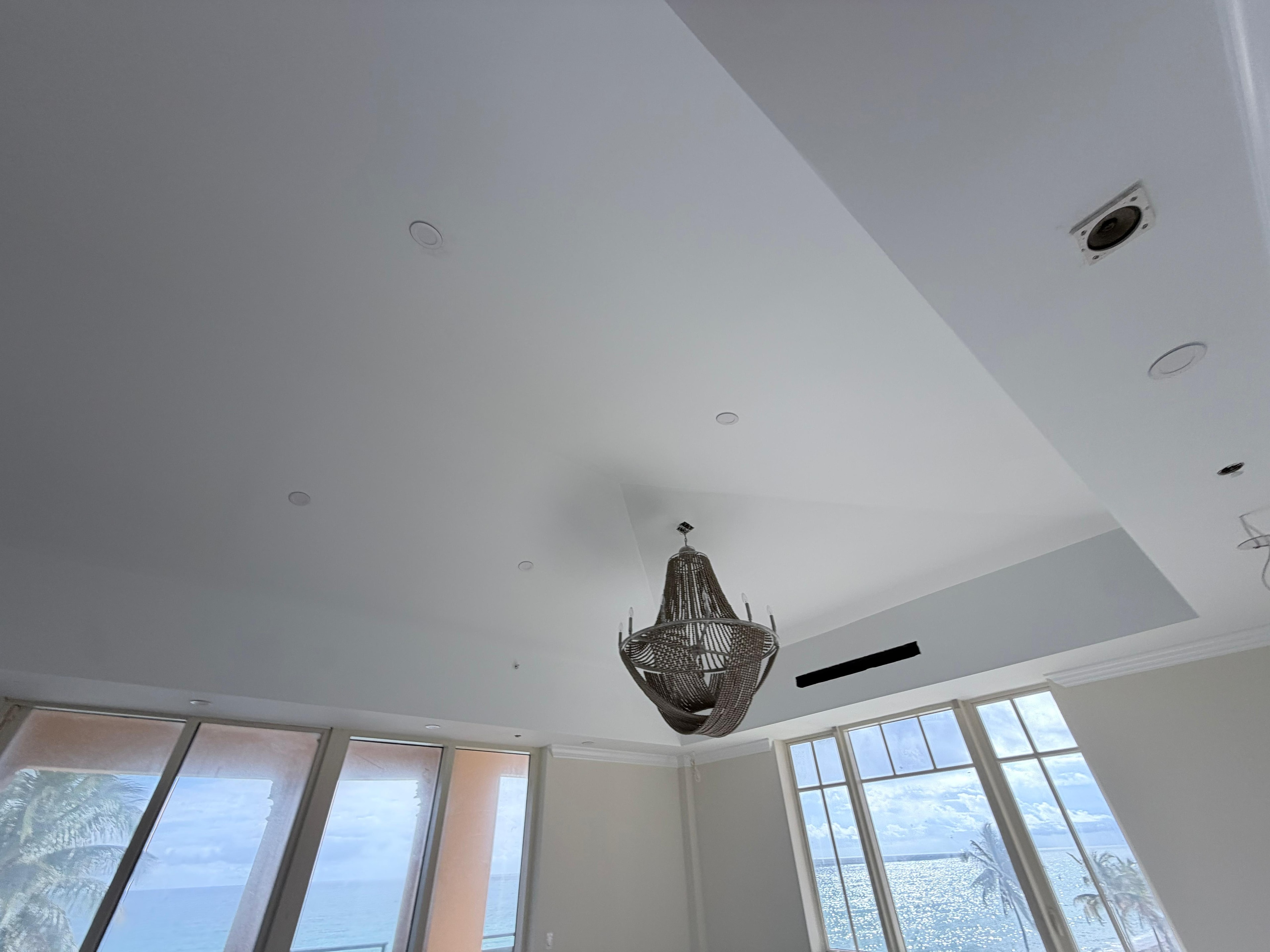 Luxury living room with panoramic ocean view — JMF Remodeling & Construction